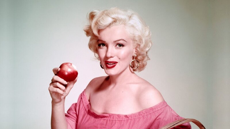 Woman Holding Apple — Pink