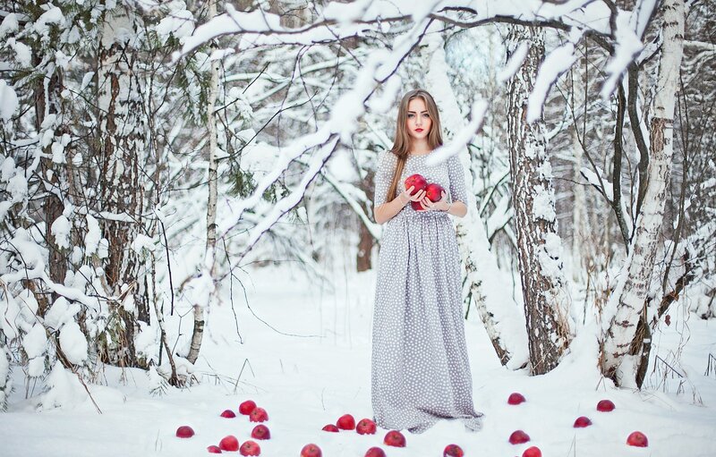 Woman Holding Apples — White, Serene, Winter, Photograph