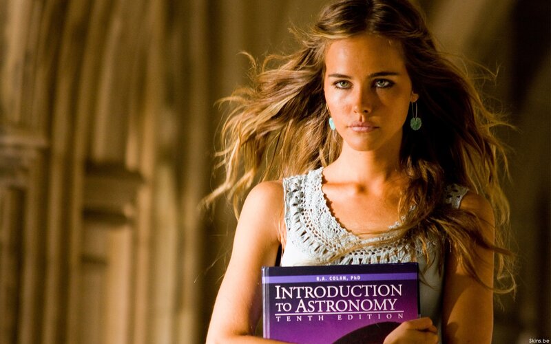 Woman holding astronomy book