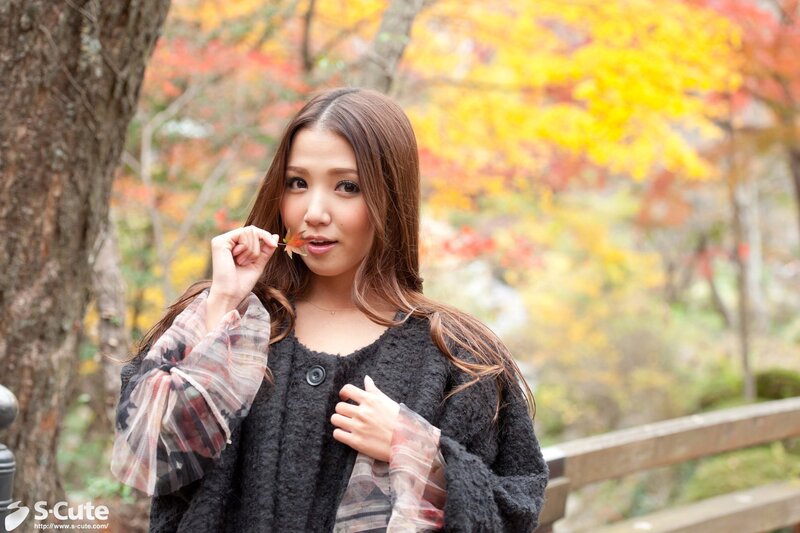 Woman Holding Autumn Leaf — Yellow, Serene, Photograph