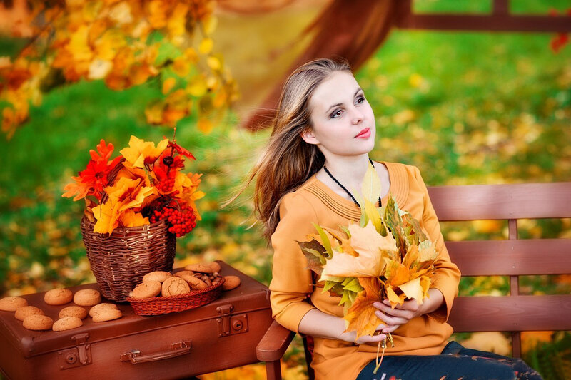 Woman Holding Autumn Leaves — Orange, Serene, Photograph