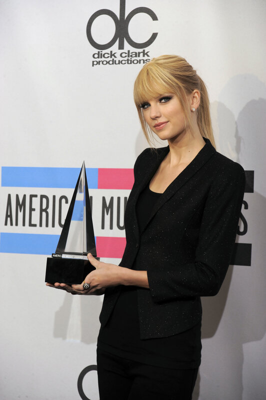 woman holding award