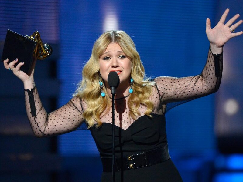 Woman Holding Award — Black, Celebratory, Photograph, Microphone