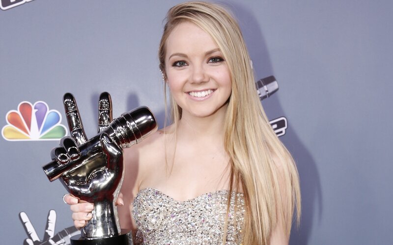 Woman Holding Award — Silver, Celebratory