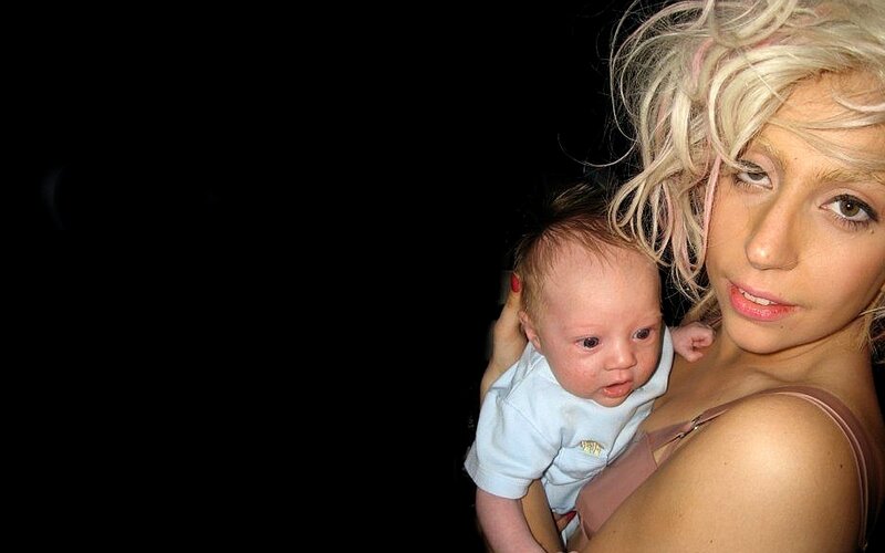 Woman Holding Baby — Black, Intimate
