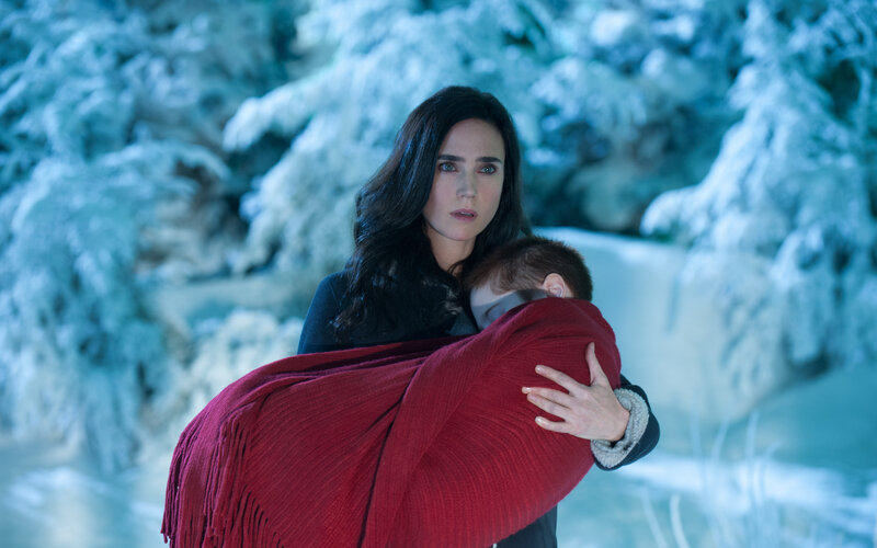 Woman Holding Baby — Red, Dramatic, Winter