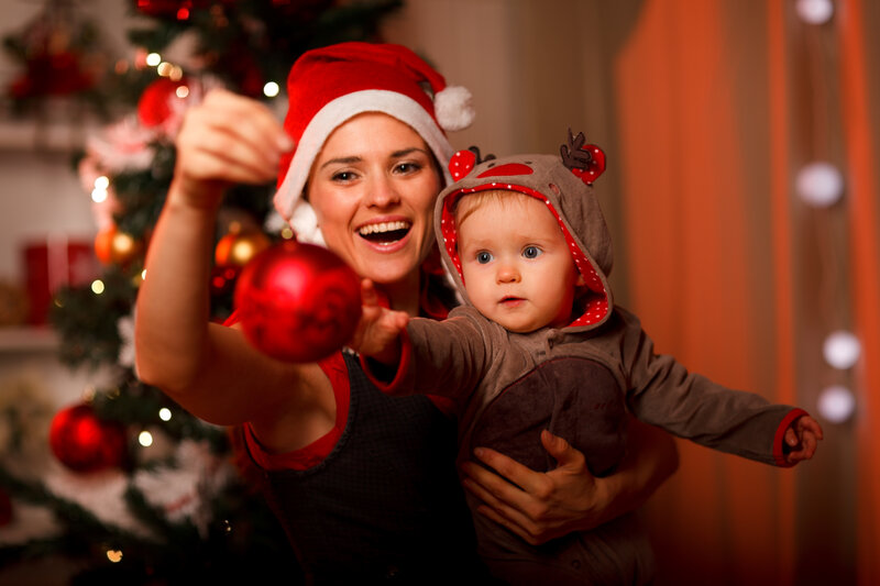 Woman Holding Baby — Red, Festive