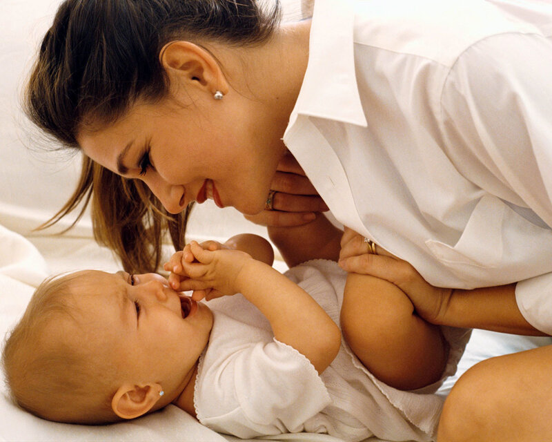 Woman Holding Baby — White, Affectionate