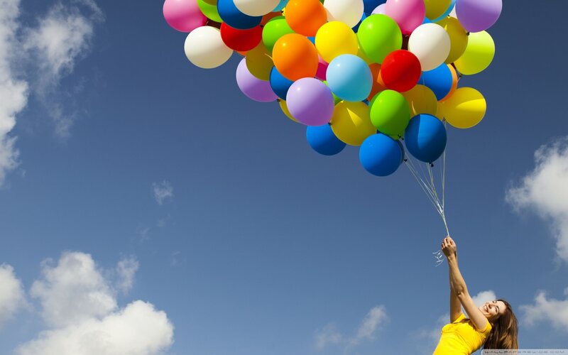 Woman Holding Balloons — Blue