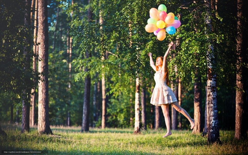Woman Holding Balloons — Green, Joyful, Afternoon