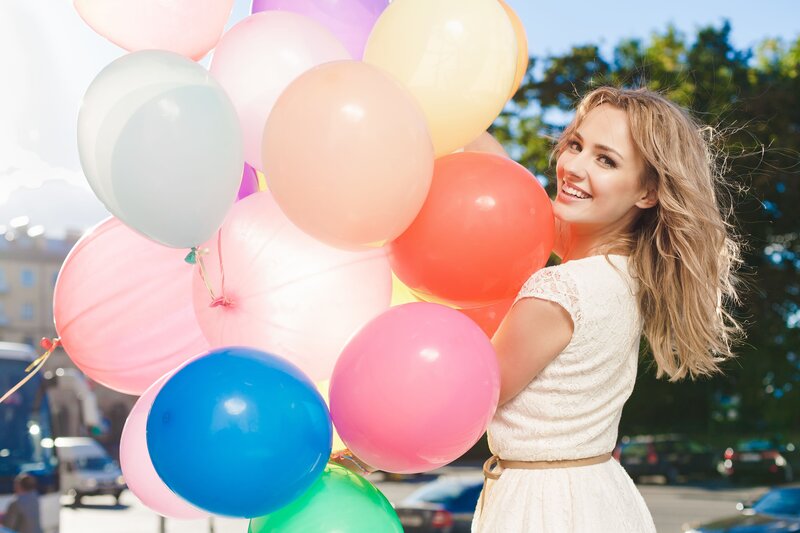 Woman Holding Balloons — Pink, Happy