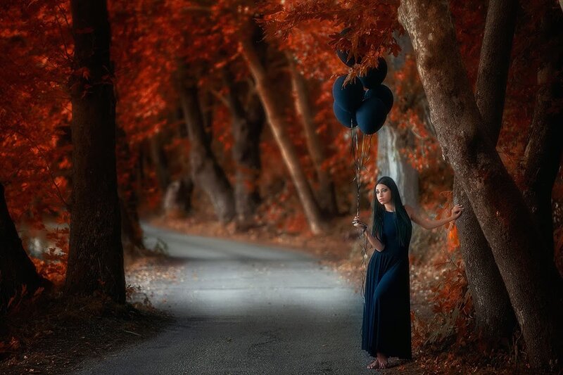 Woman Holding Balloons — Red, Dramatic