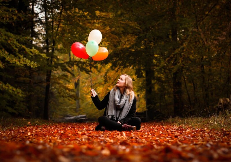 Woman Holding Balloons — Red, Serene