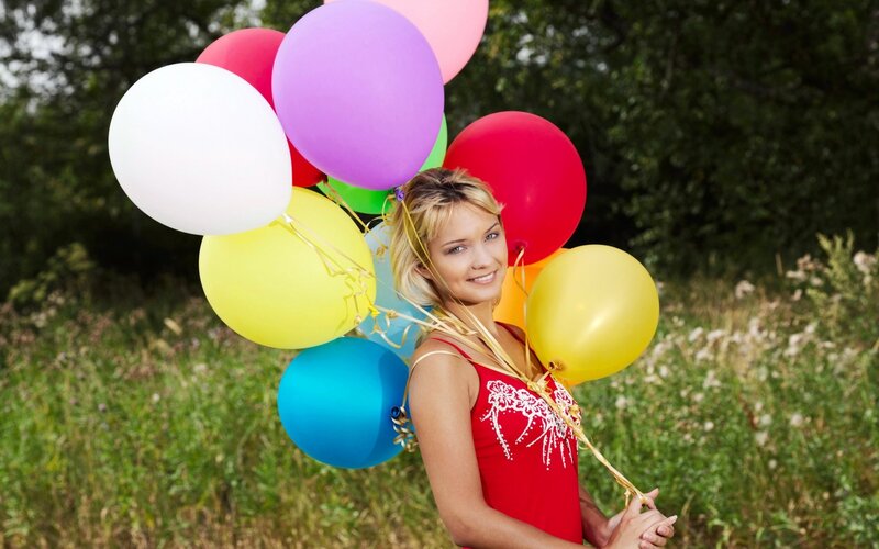 Woman Holding Balloons — Red