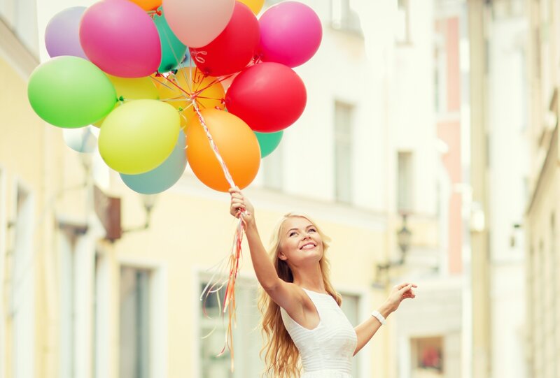 Woman Holding Balloons — White, Joyful, Afternoon, Photograph, Buildings