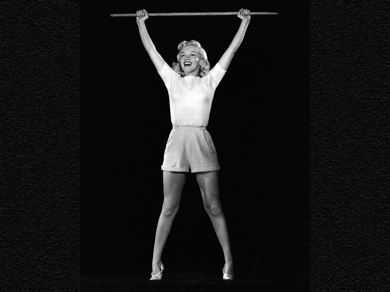 Woman Holding Bar