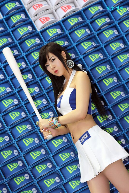 woman holding baseball bat