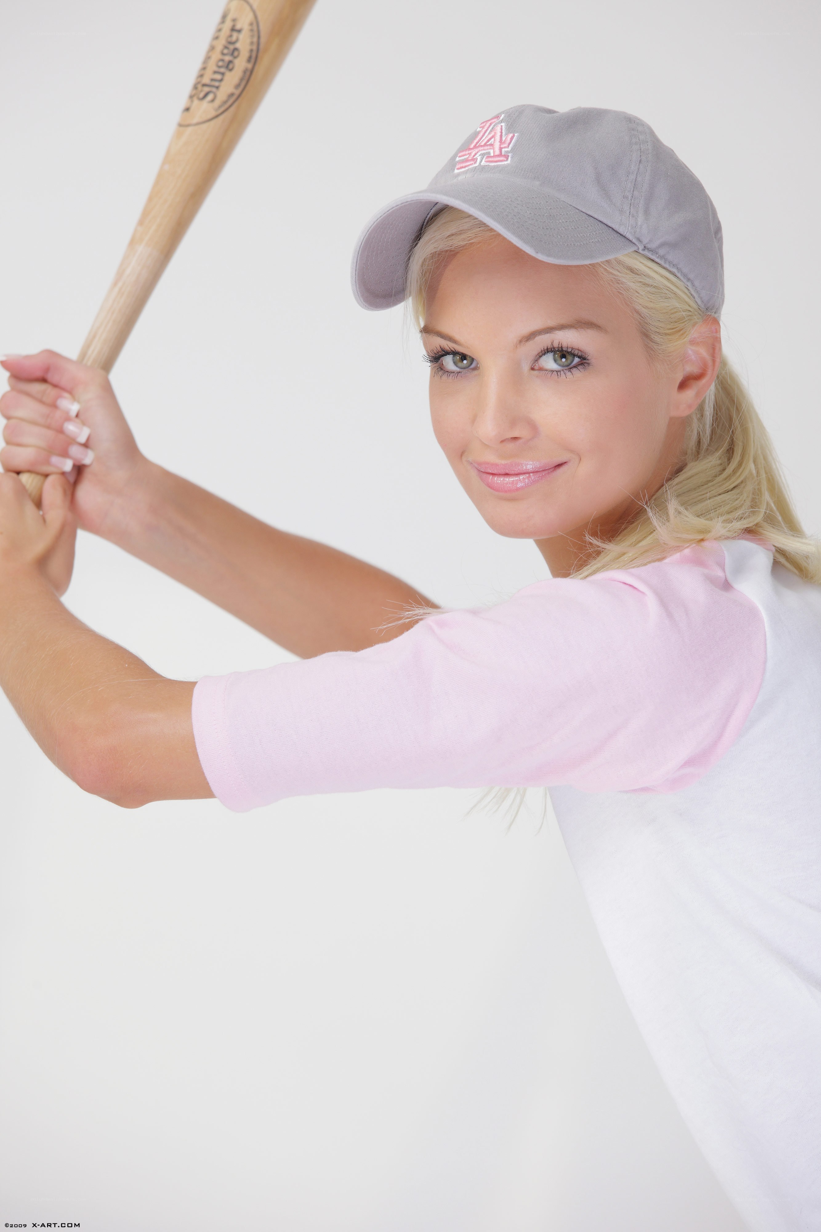woman holding baseball bat