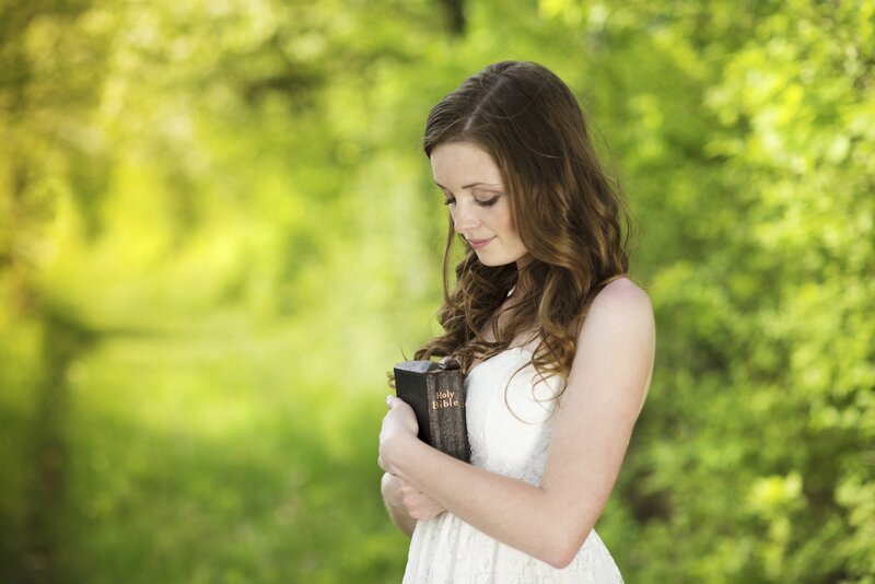 Woman Holding Bible