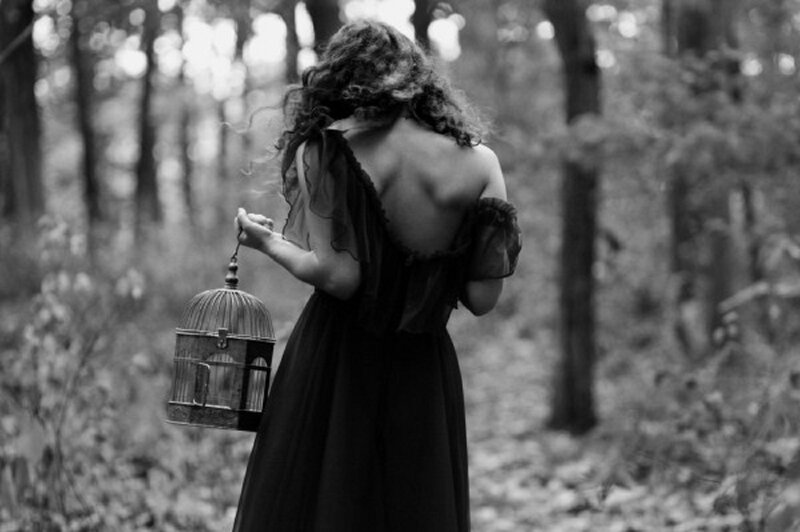 Woman Holding Birdcage — Black, Dramatic, Photograph