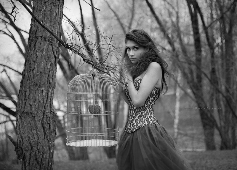 Woman Holding Birdcage — Black