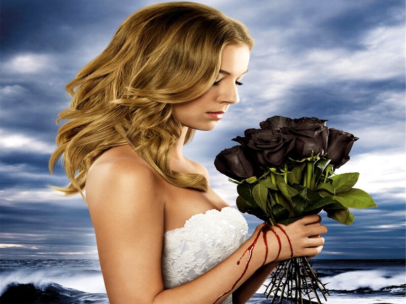 Woman Holding Black Roses — Blue