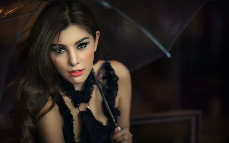 Woman Holding Black Umbrella — Dramatic, Night