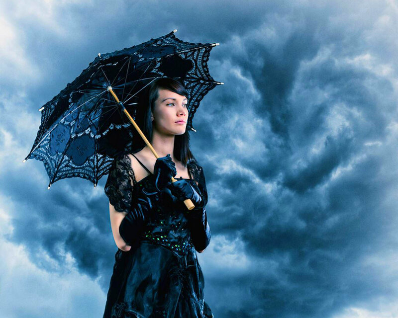 Woman Holding Black Umbrella — Dramatic, Photograph