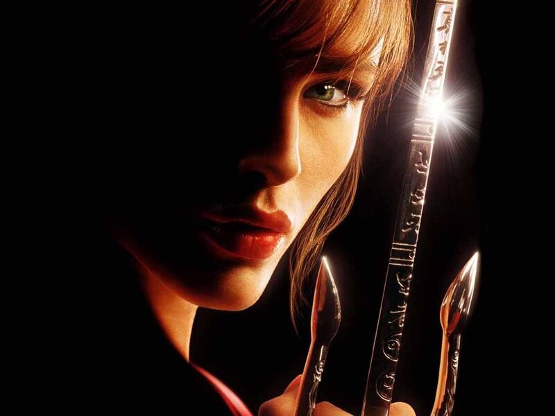 Woman Holding Blades