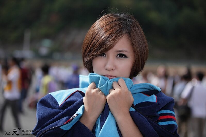 Woman Holding Blue Jacket