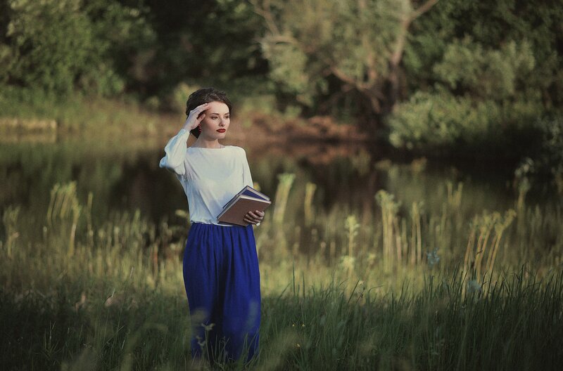 Woman Holding Book — Blue, Serene