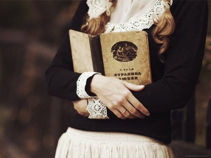 Woman Holding Book — Brown, Serene