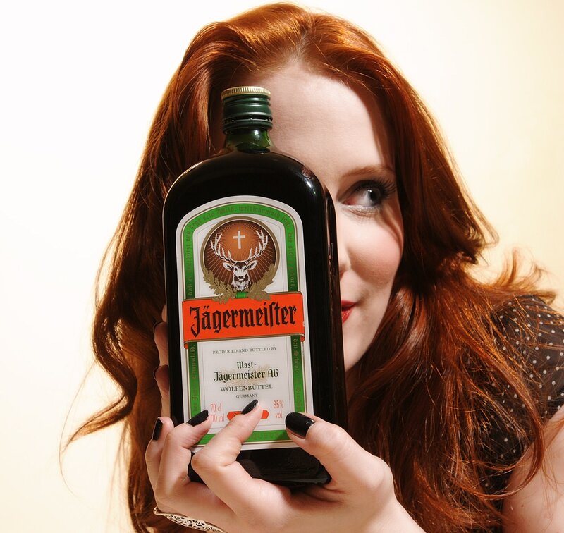 Woman Holding Bottle — Red