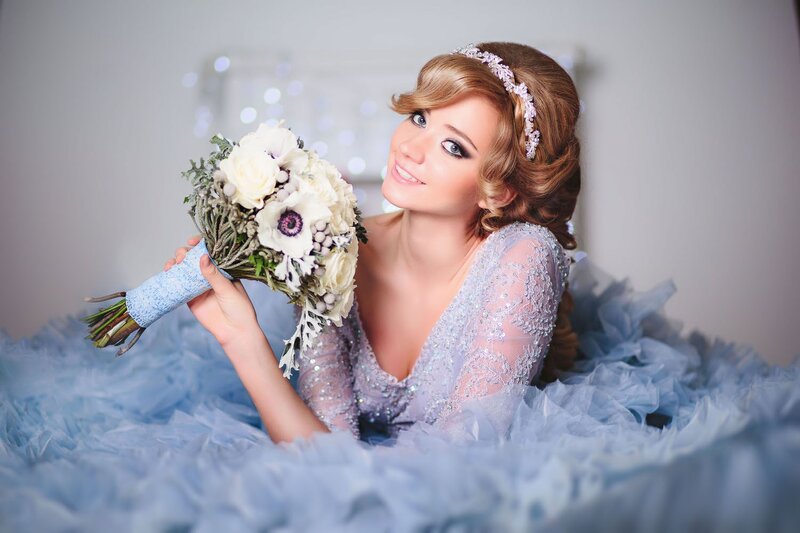 Woman Holding Bouquet — Blue, Elegant
