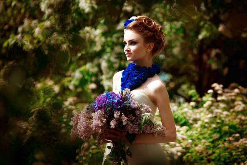 Woman Holding Bouquet — Blue