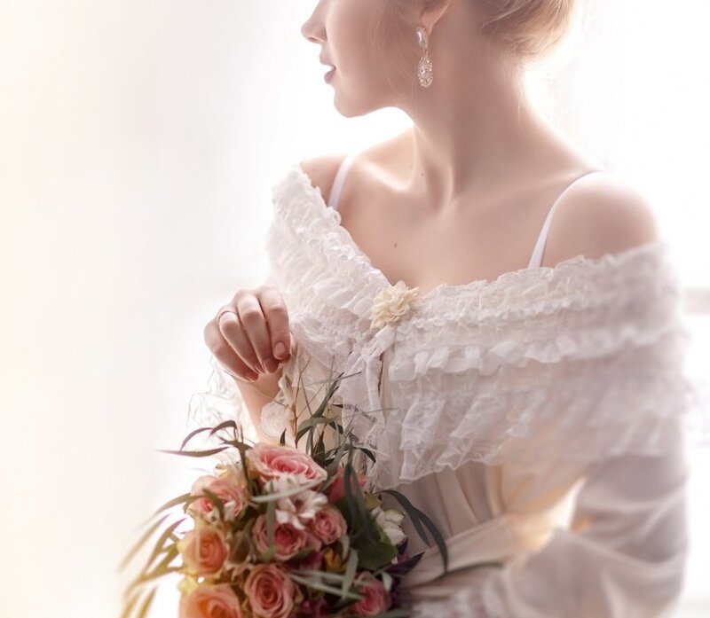 Woman Holding Bouquet — White, Serene, Morning, Photograph