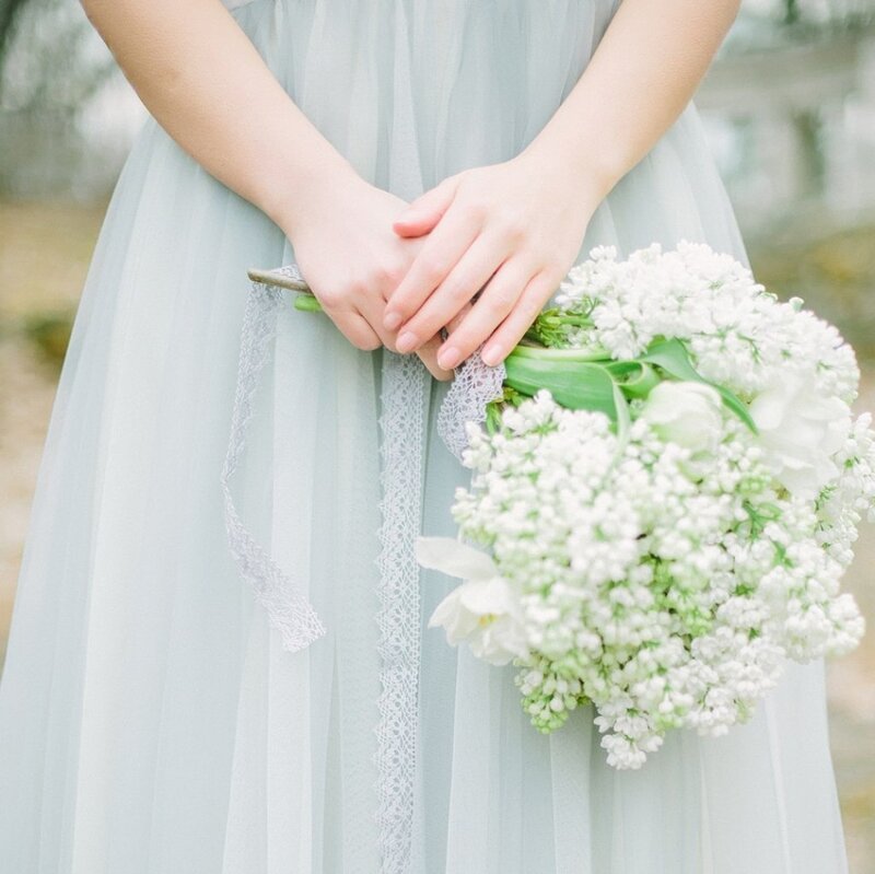 Woman Holding Bouquet — White, Serene, Spring