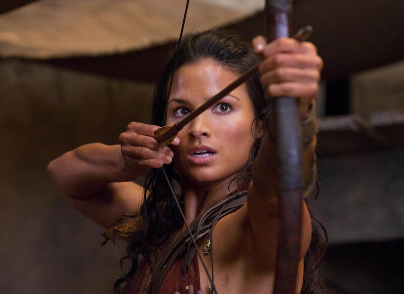 Woman Holding Bow and Arrow — Brown, Intense