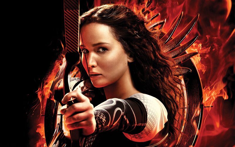 Woman Holding Bow and Arrow — Red, Dramatic, Photograph
