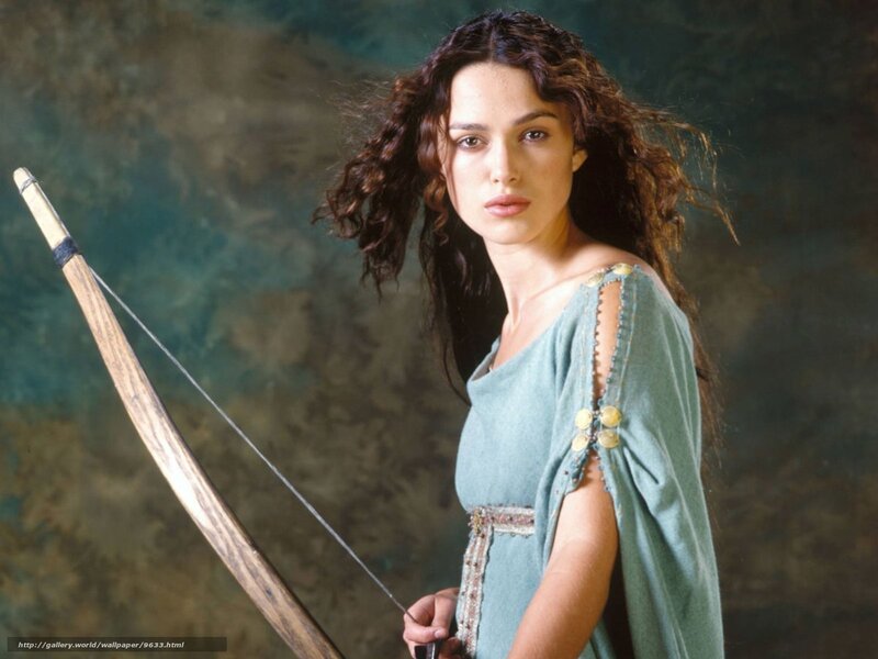 Woman Holding Bow — Green, Serious