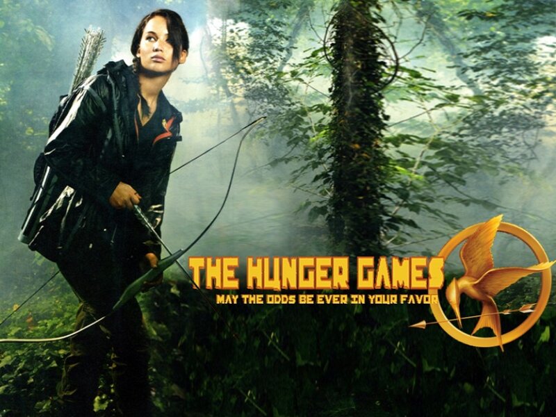 Woman Holding Bow in Forest