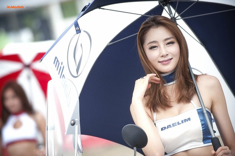 Woman holding branded umbrella
