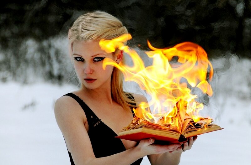 Woman Holding Burning Book — White