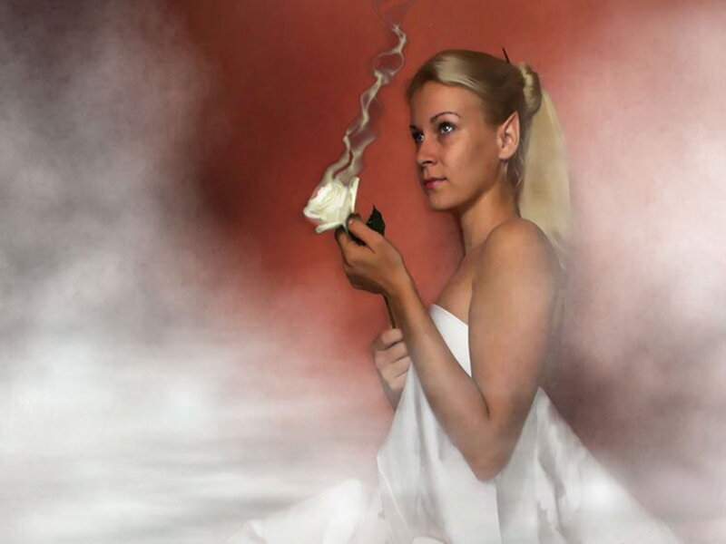 Woman Holding Burning Rose
