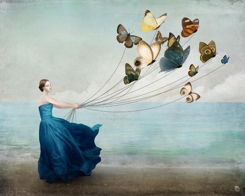 Woman Holding Butterflies