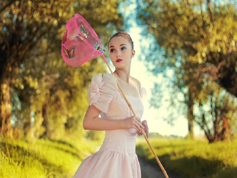Woman Holding Butterfly Net