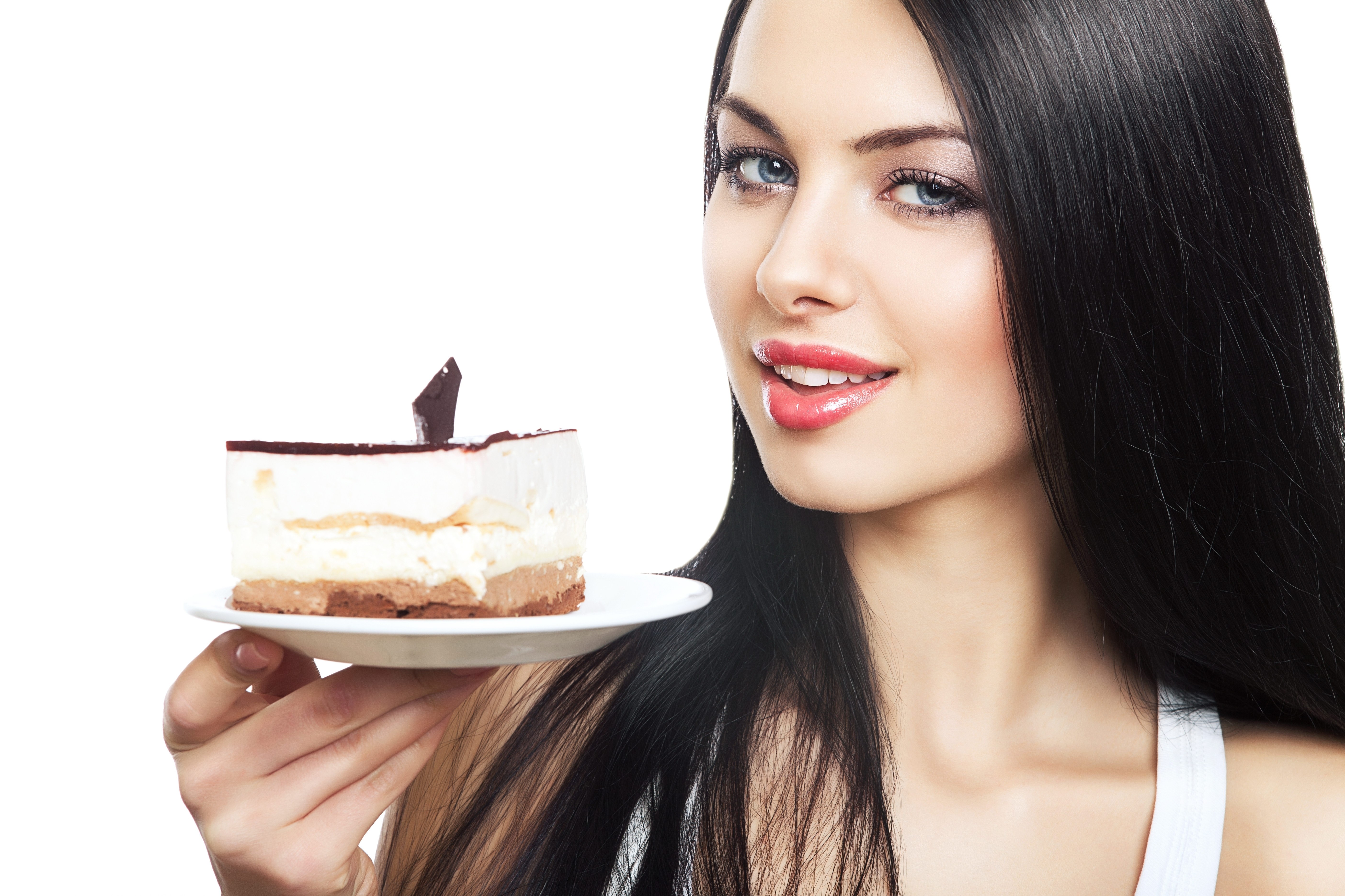 woman holding cake slice