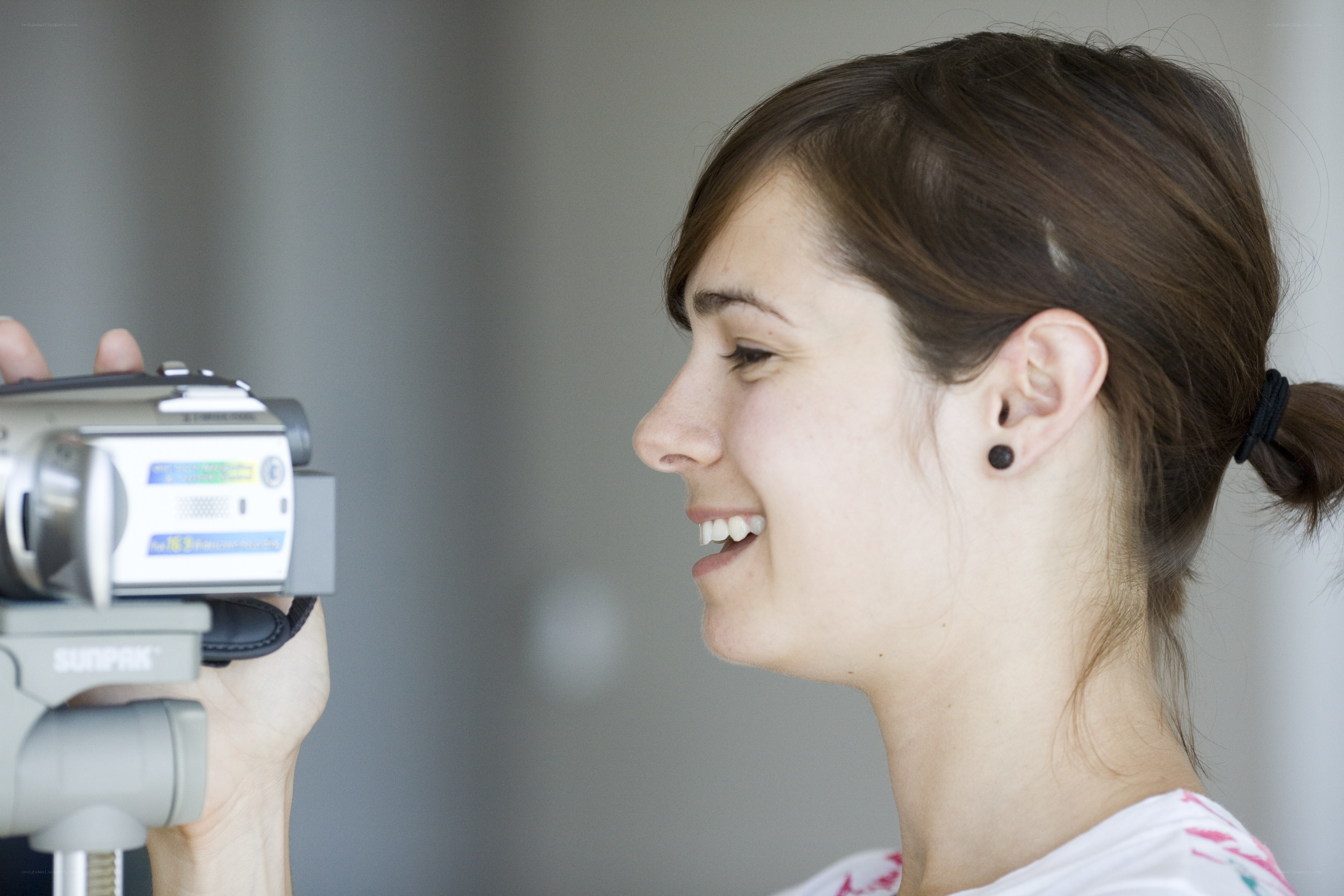 woman holding camcorder