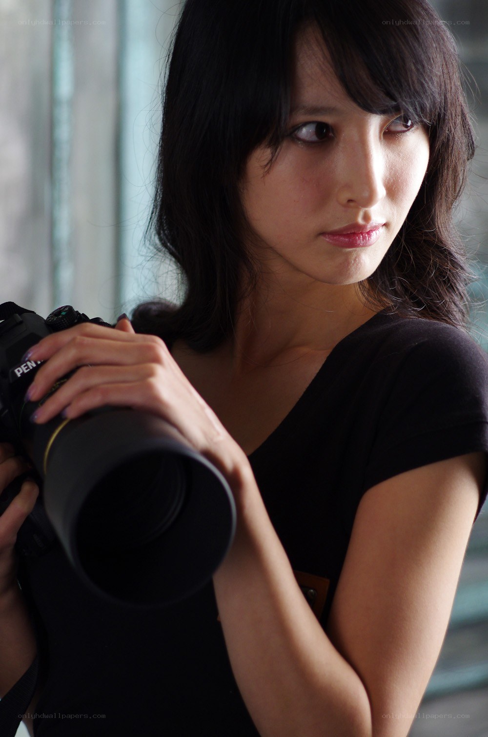 woman holding camera