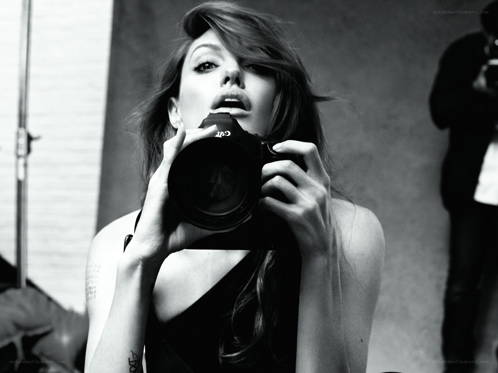 woman holding camera